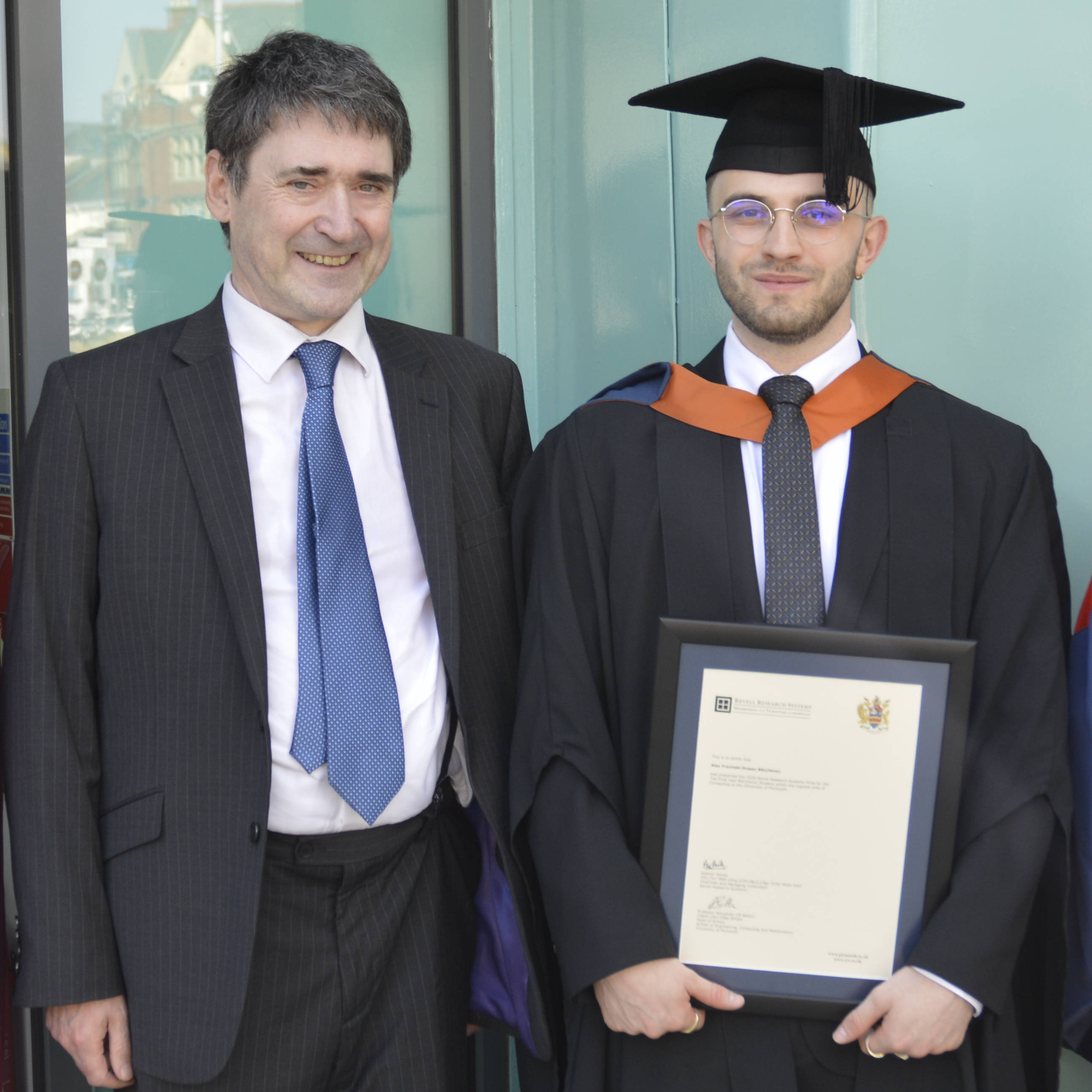 Alex Trzcinski-Draper with Alastair Revell (left).