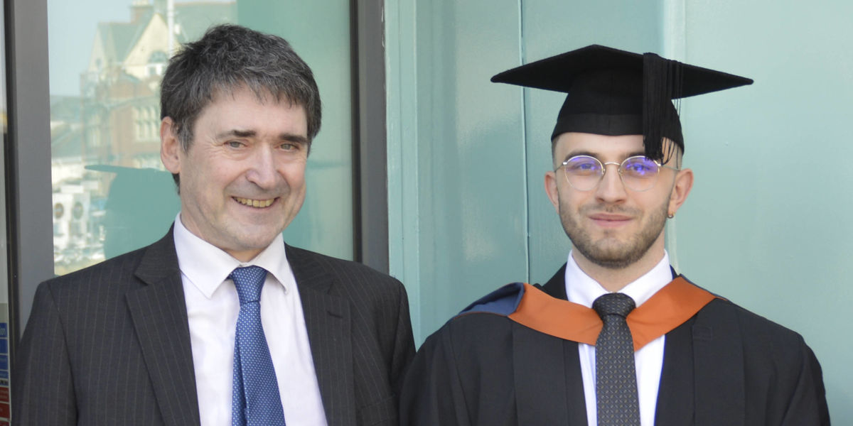 Alex Trzcinski-Draper with Alastair Revell (left)